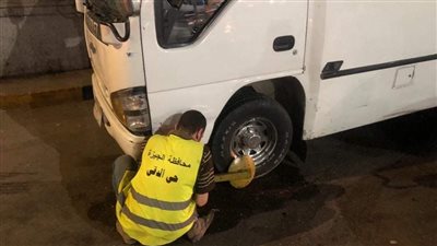 ضبط 18 مخالفة وتحرير غرامات فورية لبعض قائدي سيارات الأجرة بالدقي | صور