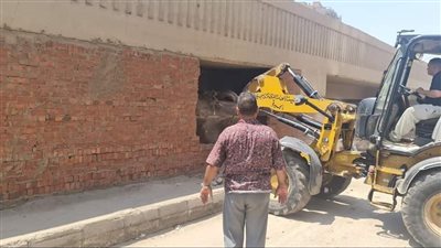 رفع كفاءة الساحات أسفل محور الفريق كمال عامر بالعمرانية | صور