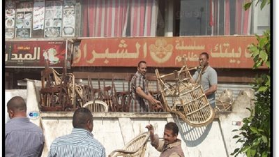 بالصور.. حملة مكبرة لرفع الإشغالات بشارع فيصل