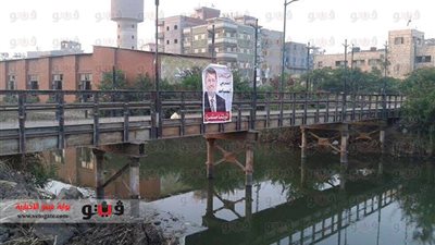 بالصور.. تعليق صور المعزول على المباني الحكومية بالدقهلية