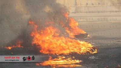 مجهولون يشعلون النيران في إطارات السيارات على شريط السكة الحديدية بسوهاج